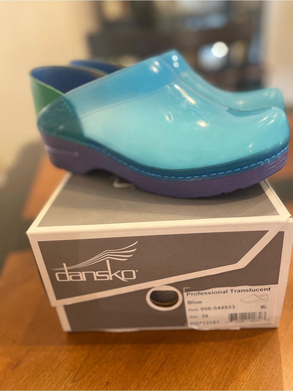 Dansko Kids Translucent Turquoise Clogs with Purple Sole and Green Heel